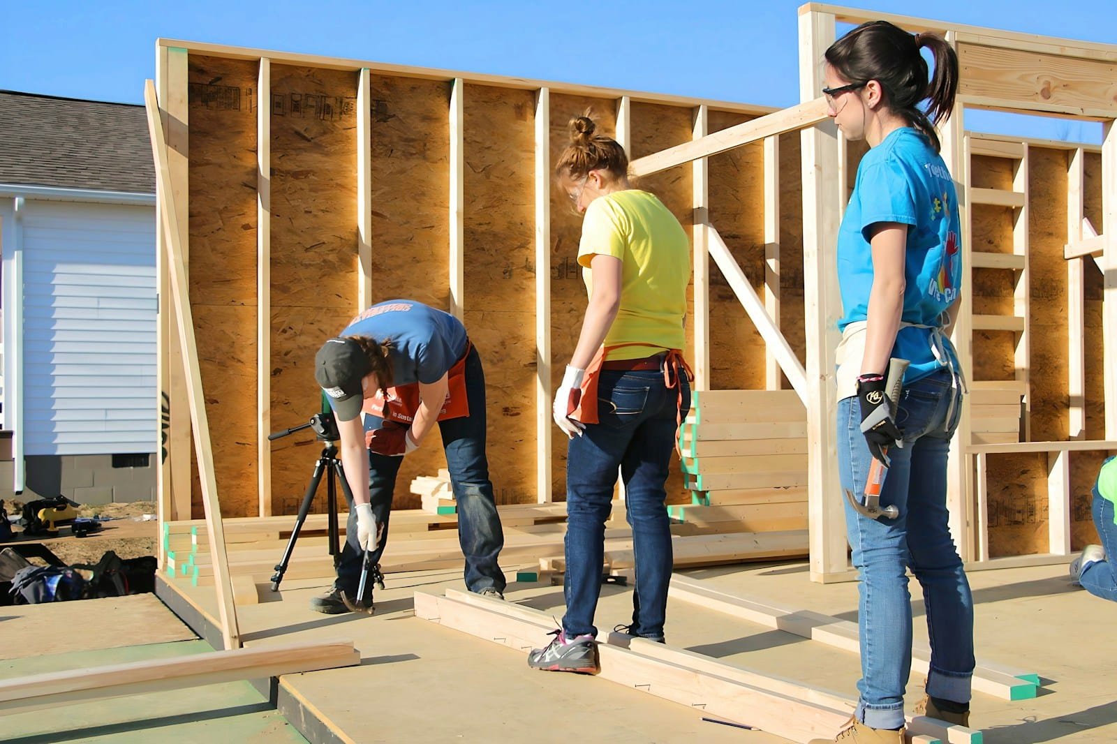 Eager colunteers building a frame