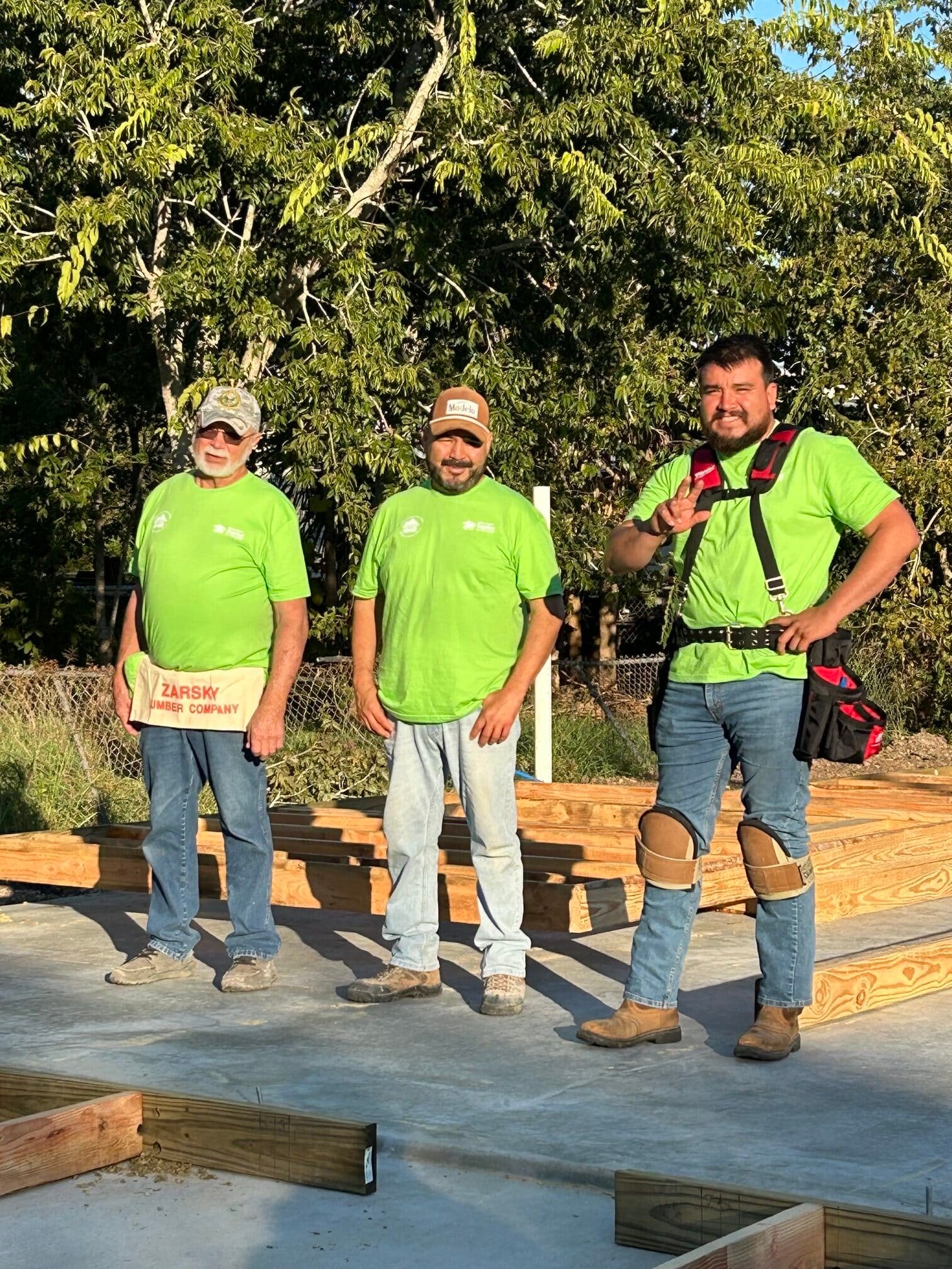 Core volunteers taking a break on a Golden Crescent Habitat build site